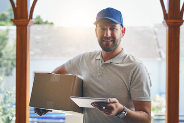 Happy delivery man, box and tablet in logistics, ecommerce or courier service at front door....