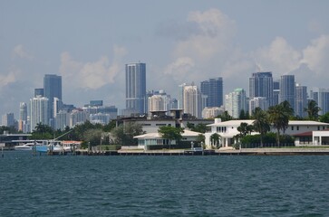 city skyline and Upscale homes on Dilido Island in `Miami Beach,Florida