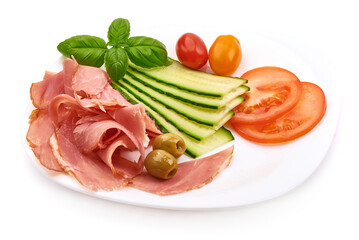 Sliced Hot smoked ham with vegetables, isolated on white background.