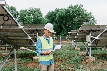 Engineer technician checking and operating system of solar cell farm power plant ,Solar station...