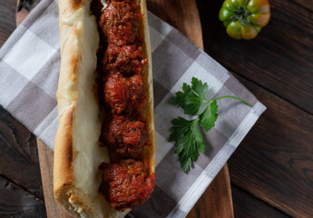 Meatball sandwich with tomato sauce and mozzarella cheese