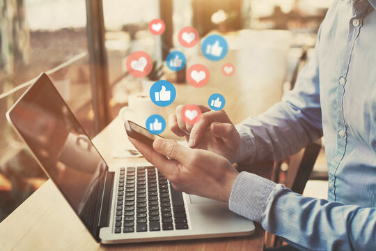 like and follow on social media, closeup of hands and icons of likes