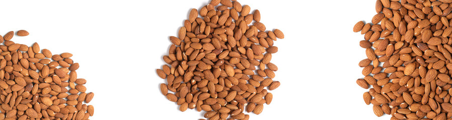 Banner with three piles almonds on white background.