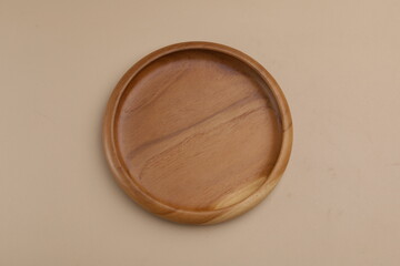 Empty wooden plate, isolated, copy space