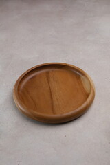 Empty wooden plate, isolated, copy space