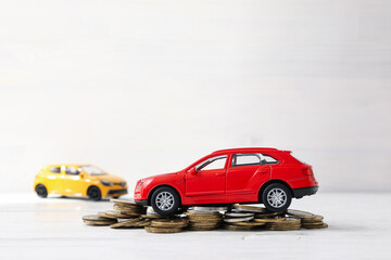 Fototapeta na wymiar Concept of car purchase and insurance with toy car