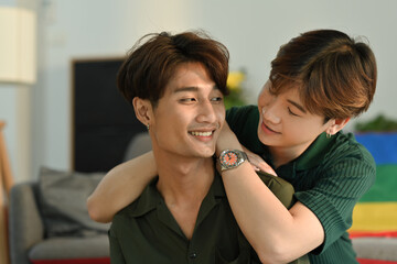 Affectionate moment of gay couple while embracing each other. LGBT, love and lifestyle relationship concept