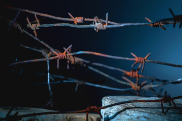 Abstract image of barbed wire as a symbol of violence, war, human rights violations, dictatorship...