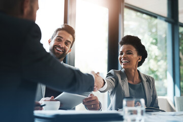 Happy business people, handshake and meeting in teamwork for partnership or collaboration in boardroom. Woman person shaking hands in team recruiting, introduction or b2b agreement at the workplace - Powered by Adobe