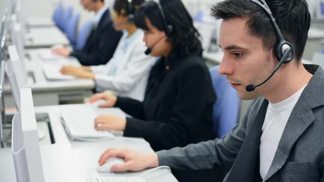 Group of multinational people working in office. Call center. Operators. 