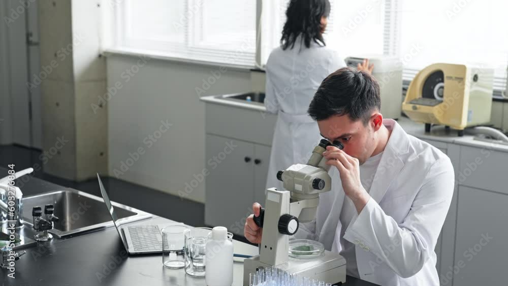 Aufkleber Group of multinational scientists working in laboratory.