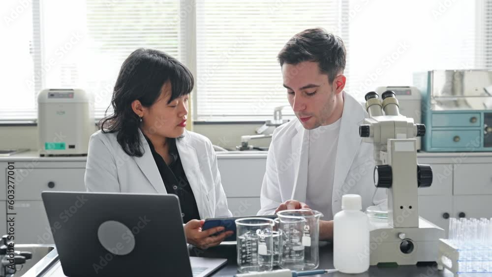 Poster Group of multinational scientists working in laboratory.