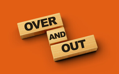 Wooden blocks over and out word isolated background 3d illustration