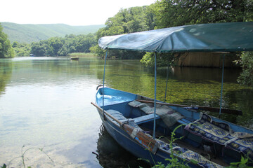 Fototapeta premium A boat on the riverside of Ohrid, Macedonia. Selective focus on the boat.