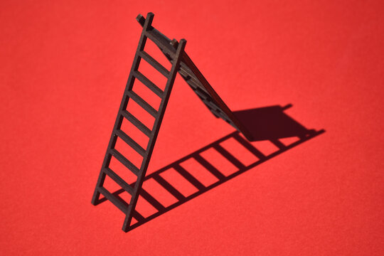 Close-up of Stair against red background