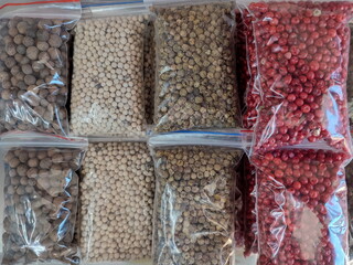 various spices and herbs packed in small transparent plastic bags