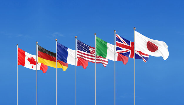 Big Seven. Flags of countries of Group of Seven Japan, Canada, Germany, Italy, France, USA , UK. The 49 th G7 Hiroshima summit on 19&ndash;21 May 2023 in the Japan. Sky background. 3D illustration.