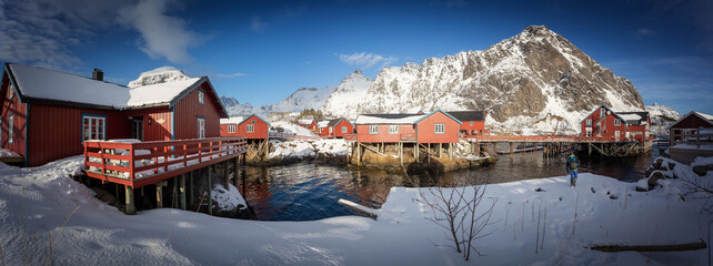  Nusfjord village. Famous and one of the most authentic fishing village Nusfjord with colorful red and yellow wooden houses. Norway, Lofoten Islands,