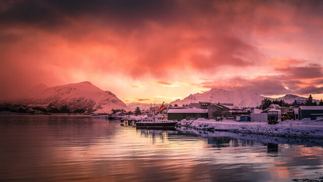 Sunset view of the picturesque fishing village. Winter vivid landscape. Sunset in Norway, Lofoten islands.
