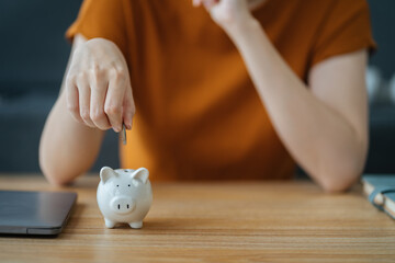 Obraz na płótnie Canvas Woman thinking concept saving money and finance accounting.