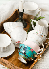 Porcelain vintage tea cups on a tray