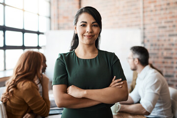 Portrait, office meeting and business woman with arms crossed in company workplace. Face, confidence and happy female leader, professional and person with pride for career, job and success mindset.