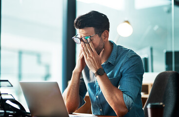 Headache, stress and tired business man at laptop in office for anxiety, debt crisis and eye strain...