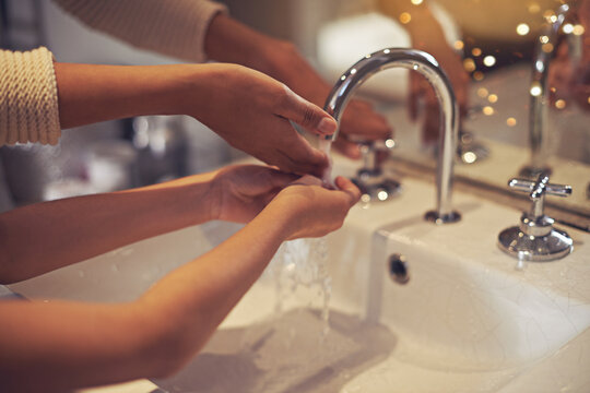 Water, Closeup And Washing Hands By Mother And Child In A Bathroom For Learning, Hygiene And Care. Basin, Home And Hand Cleaning By Mom And Girl Together For Prevention Of Bacteria, Dirt And Germs