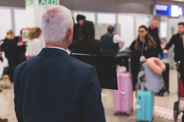 Meeting at the airport, person holding a placard card sign with welcome title text, greeting...