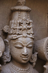 Carved idols on the inner wall and pillars of Rani ki vav, an intricately constructed stepwell on the banks of Saraswati River. Patan in Gujarat, India.