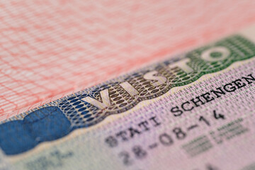 close-up part of page of document, foreign passport for travel with European visa, tourist schengen...