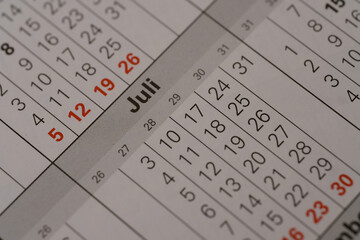 Months june and dates, part of calendar in German, days of week, concept of public holidays, days off, deadline at work , meet deadline