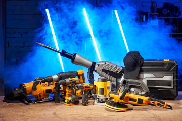 set of electric tools in one place: angle grinder, jigsaw, puncher, screwdriver, wrench, milling...