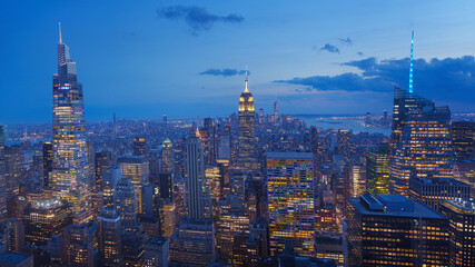 big skyline New York City panorama after sunset at night.