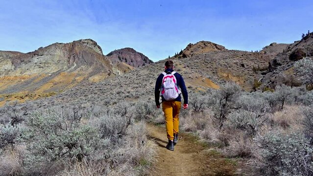 Caucasian Male Hiking the Volcanic Canyons of Kamloops: Cinnamon Ridge Adventure