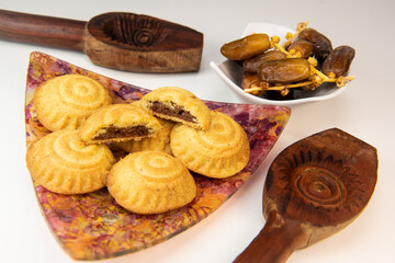 Traditional eid maamoul or mamoul cookies with dates, nuts, and jam, Arabic sweets for Aid al-Fitr...