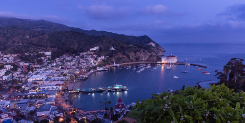 Avalon Harbor at dusk with illuminated casino