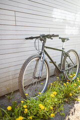Fototapeta na wymiar Modern sport mountain bike leaning wall. Active lifestyle.