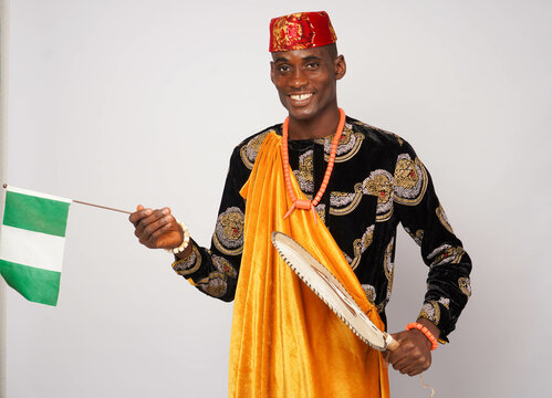 portrait of Happy African man dressed in traditional Ibo attire.