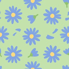 Seamless pattern with blue flowers on a soft green background.