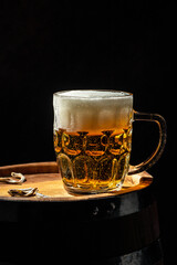 beer, wheat ears on a wooden board. banner, menu, recipe place for text