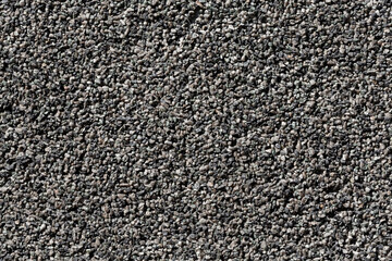 Crushed granite stones wall - close up