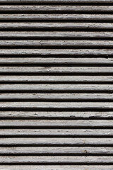 wooden shutters, covering a window or door