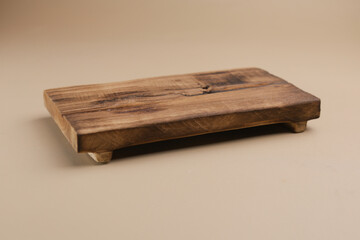 Wooden cutting board on the table, isolated