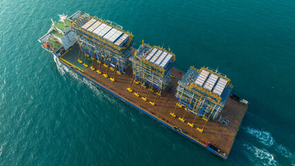 Tender Drilling Oil Rig on Barge Ship transportation Rid to Oil Rig in The Middle of The Ocean at...