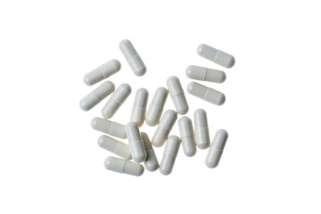 scattered pills in white capsules, on an isolated transparent background top view