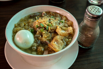 Batchoy, a Filipino noodle soup of pork offal, crushed pork cracklings, chicken stock, beef loin and round noodles. Originating in the district of La Paz, Iloilo City.