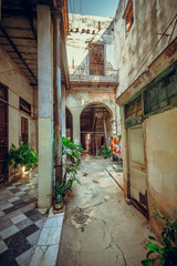 Fototapeta na wymiar Courtyard in an old building in Havana, Cuba