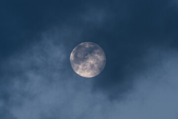 Naklejka na ściany i meble Full moon with dark clouds