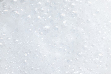 Obraz premium Soap bubbles.Abstract background white soapy foam texture.Shampoo foam with bubbles.Indoors shot.